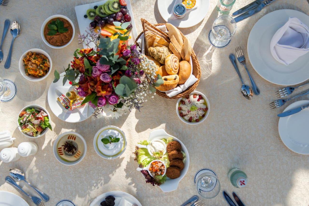 Vittori Palace Hotel And Residences Riyad Extérieur photo Israeli cuisine